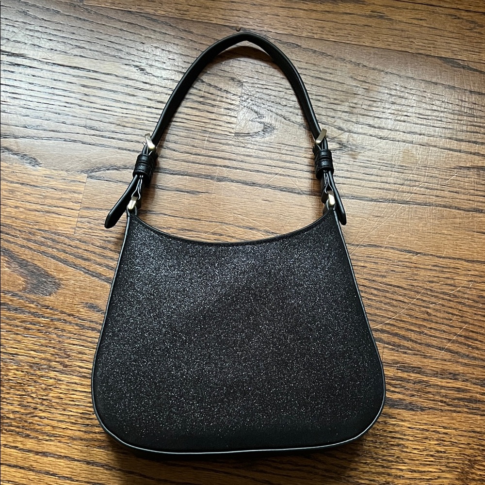 🆕KATE SPADE Glittery Black Shoulder Bag Measurements
1.5" W x 8.25" H x 8.75" D - Picture 2 of 5